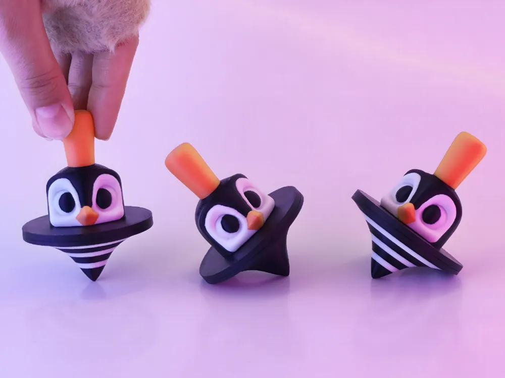 Trompo pingüino antistress
